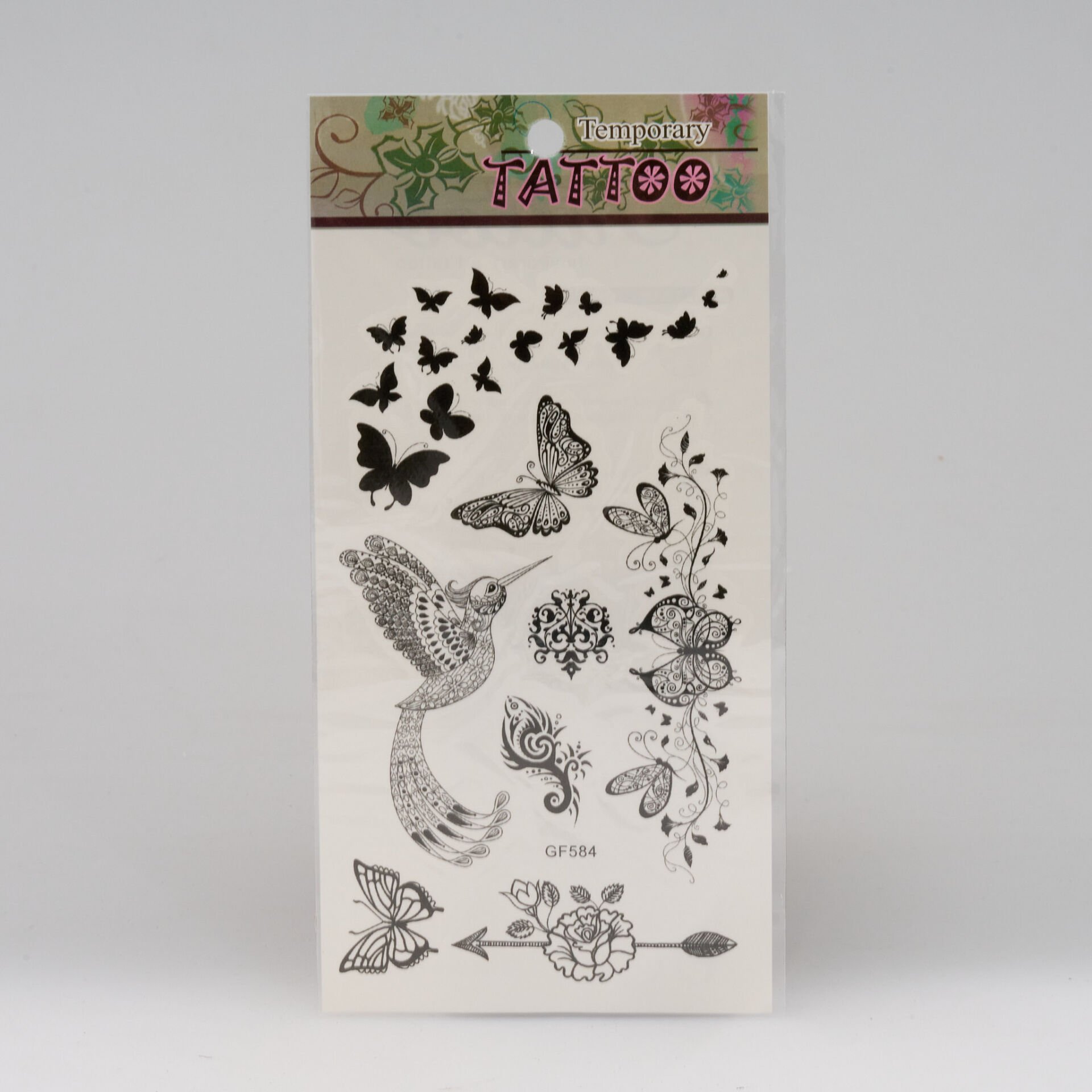 SMALL, SIMPLE, SINGLE MODEL TATTOO